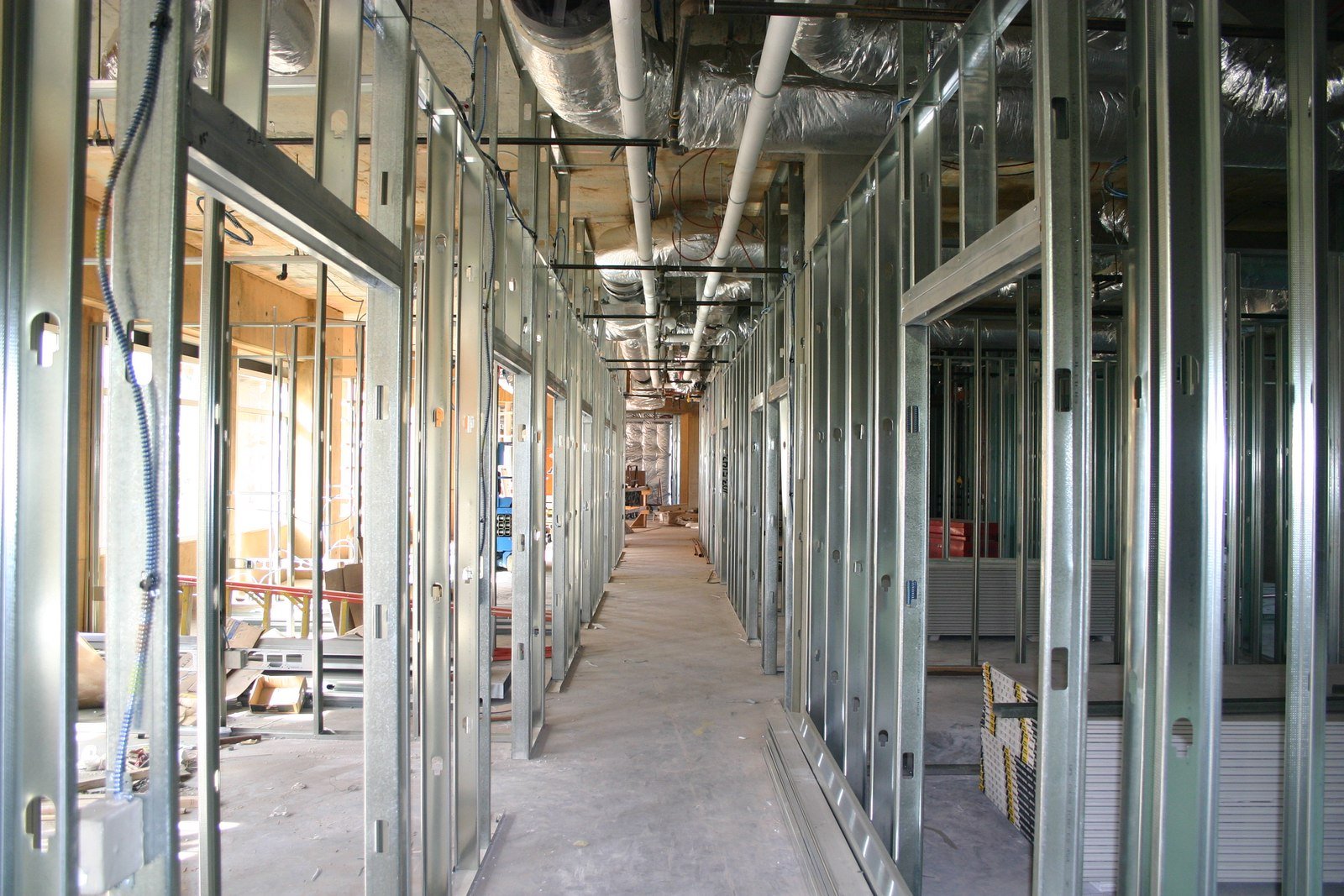 Metal stud framing and mechanical ductwork in an institutional building under construction