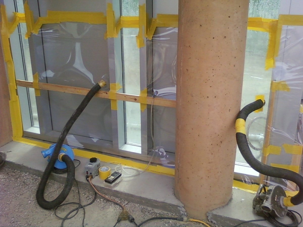 Window mock-up water penetration testing equipment at a construction site